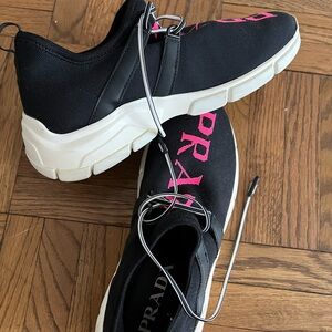 Prada sneakers.